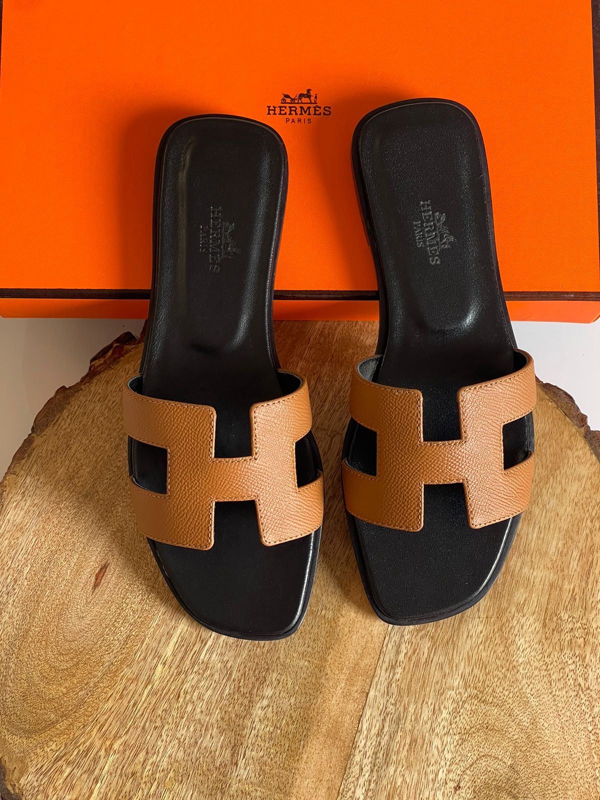 Hermès Oran Leather Sandal in Brown with Black Sole